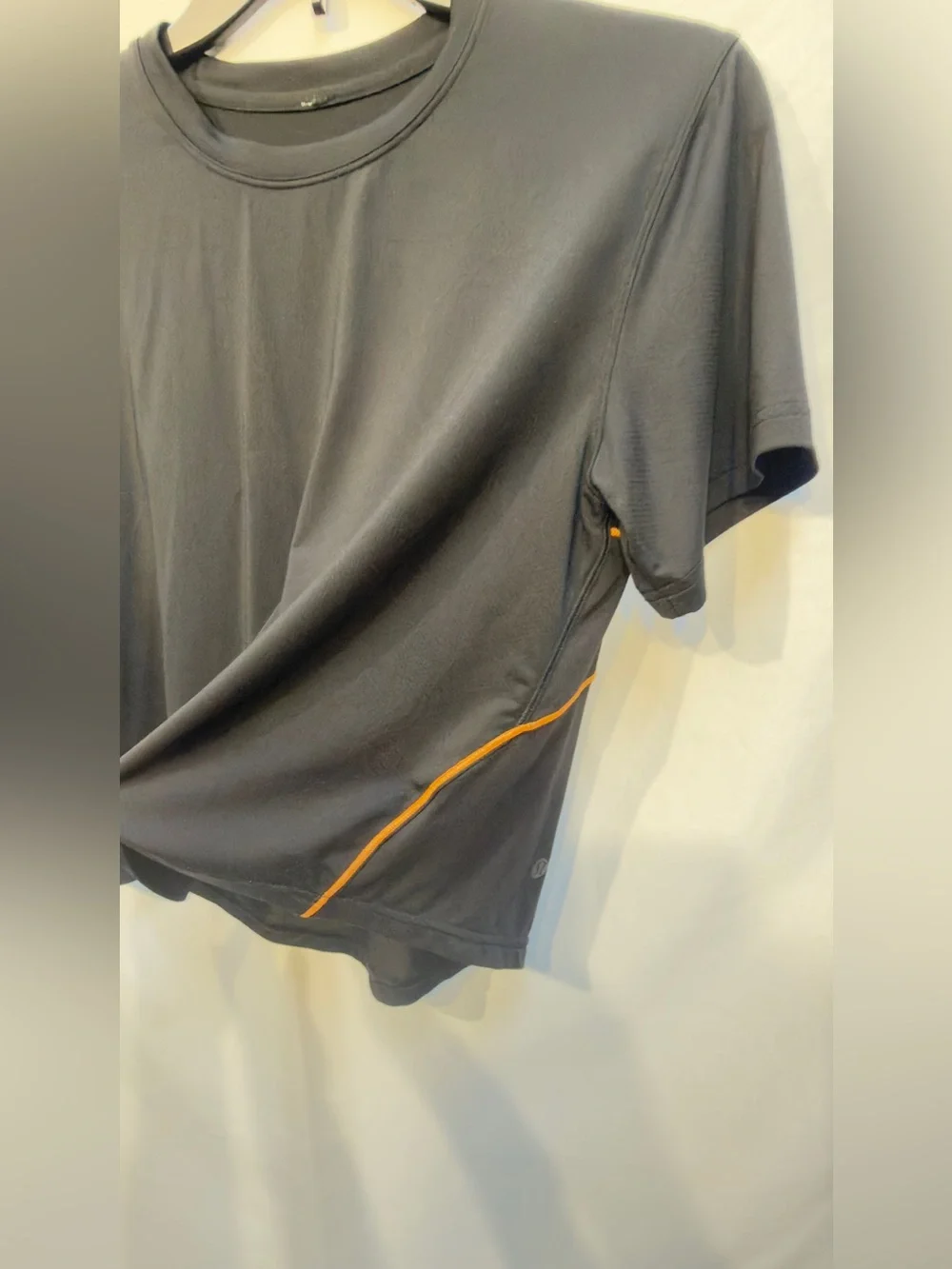 Lululemon Ventilated Open-Back Training T-Shirt in Black with Orange Soda trim